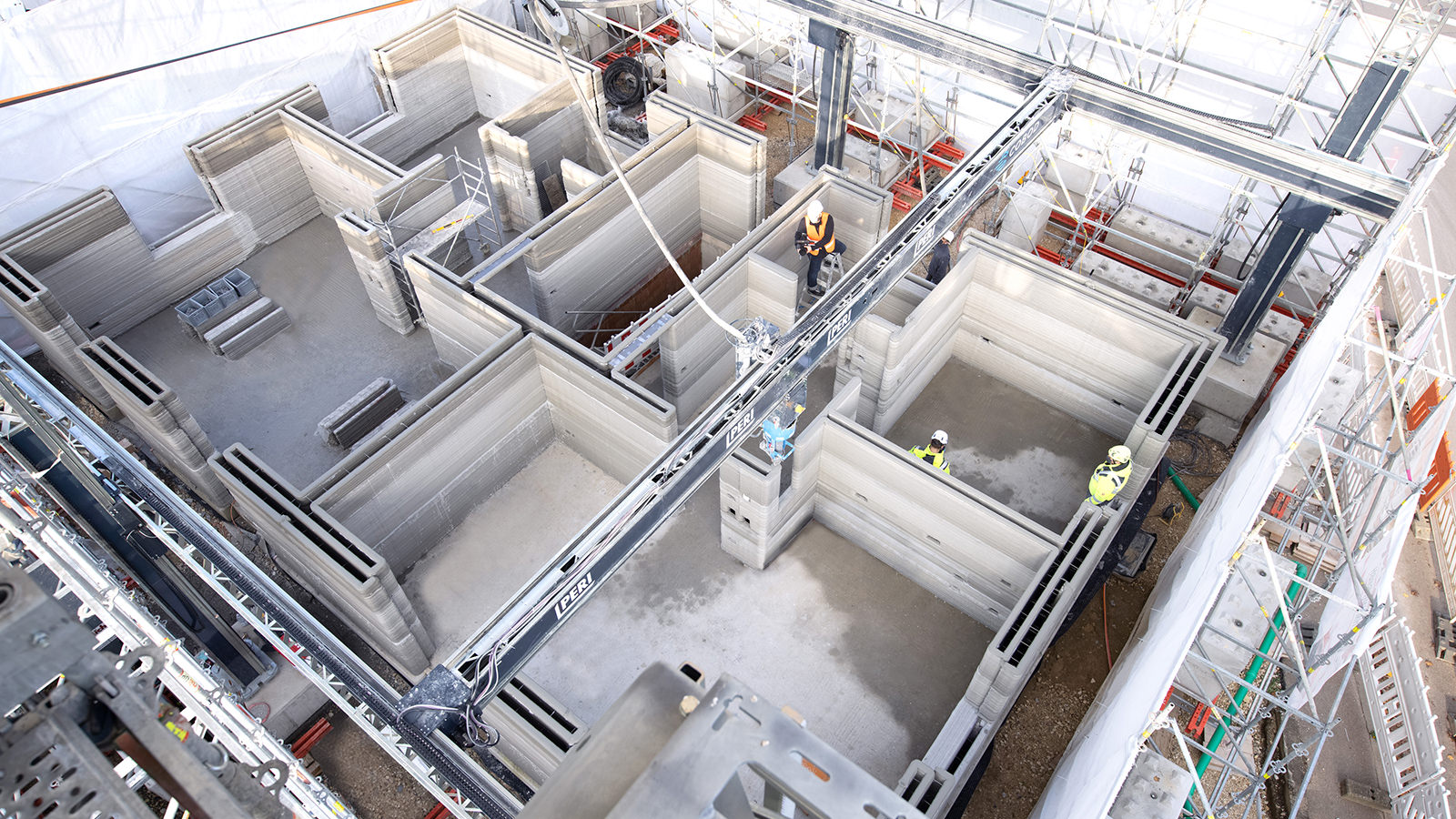 <p>PERI revolutionizes the construction process with 3D concrete printing and prints Germany&amp;#39;s first residential building and the largest apartment building in Europe. While the two-storey single-family house still measures approx. 80 sqm of living space per floor, the 5-family house with 3 floors already comprises around 380 sqm of living space.</p><br/>